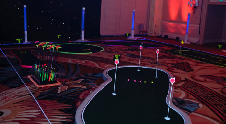 Image: Cosmic putt-putt. Recreational activity planning and corporate team builidng activiites organized by Benchmarc360.