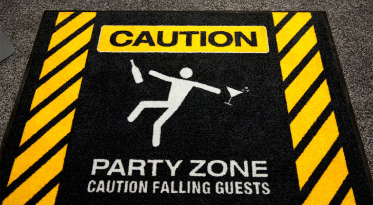Image: Caution party zone floor mat. Themed events by Benchmarc360.